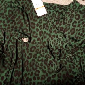 A green animal print blouse